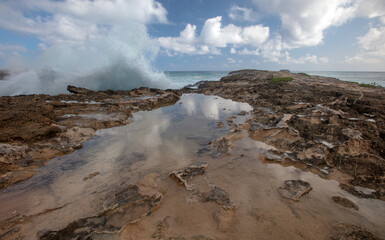 Waves crashing on Laie Point coastline at Kaawa on the North Shore of Oahu Hawaii United States