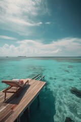 Fototapeta premium Amazing drone view of the beach and water with beautiful colors. Paradise scenery water villas with amazing sea and beach, tropical nature. summer vacation.