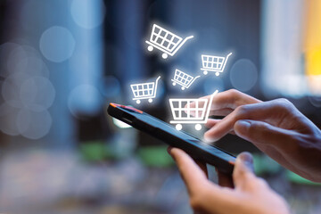woman using smartphone shopping online, shopping cart icon on screen mobile phone. purchase payment on internet. online supermarket gadget. - obrazy, fototapety, plakaty