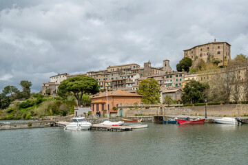 Fototapeta na wymiar The historic center of Capodimonte and the port on Lake Bolsena, Italy