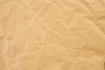 Abstract brown crumpled creased recycle paper texture background