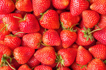 Fresh organic red strawberry fruit background