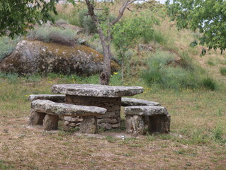 Natural stone table and chairs Picnic area Comfortable park
