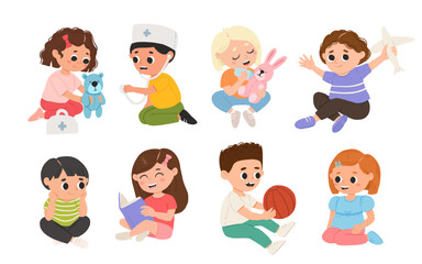 Children, kids play together having fun, fooling around in fine good mood, on playroom, playground. Preschool kids have fun. Children's activity in the kinder garden, primary school.