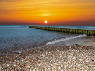 Groyne in the sunrise on the Baltic Sea