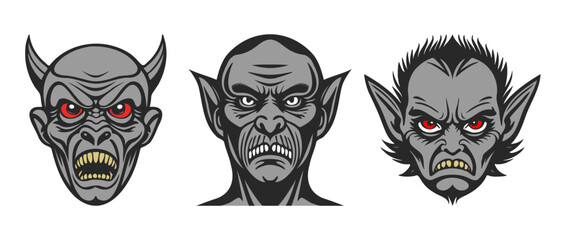 Vector set of scary sinister goblin, troll and vampire heads with red eyes and yellow teeth. Stickers, icons or badges. White isolated background.