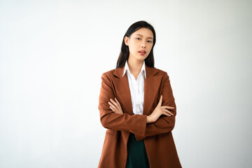 Portrait photo of young beautiful Asian woman feeling happy and holding smart phone, tablet and laptop with black empty screen on white background product presenting concept..