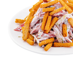 Salad with croutons and mayonnaise on plate on white background