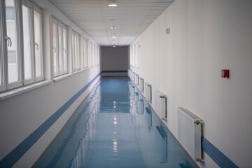 Empty corridor at public hospital, Public building corridor area. Hospital hallway with rooms. Medical concept. Institute of Cardiovascular Disease.