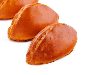 baked stuffed pies on a white