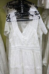 White dress with lace on hanger
