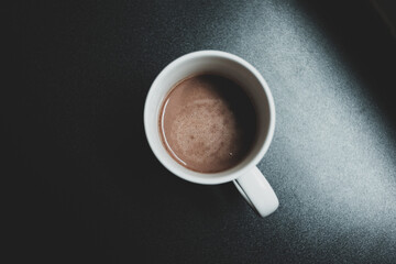 Hot chocolate drink in a white ceramic cup.