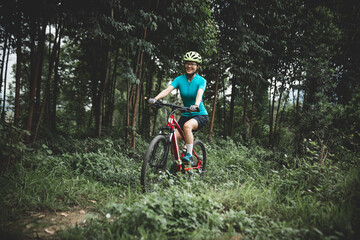 Riding bike in spring forest