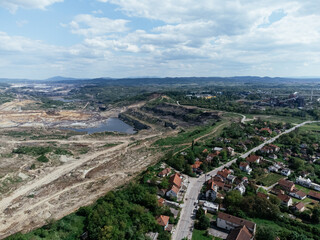 The abandoned, dead city near the Kolubara pit on coal mining by the open way. Drone view Lazarevac, Serbia