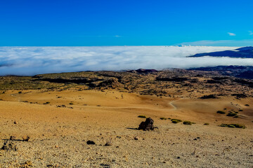 Fototapeta na wymiar Landscape above the clouds on a volcano