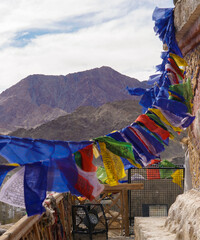 Colorful Buddhism prayer flags, lungta with Buddism symbols in Ladakh, India
