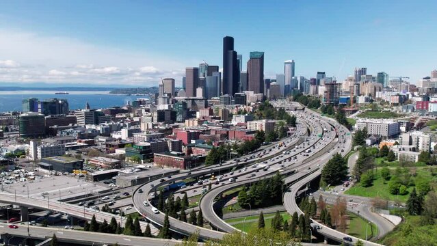 Pan of Seattle Skyline and Freeway with Clear Sky