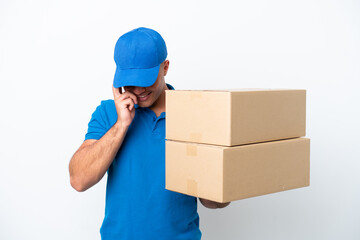 Delivery caucasian man isolated on white background laughing