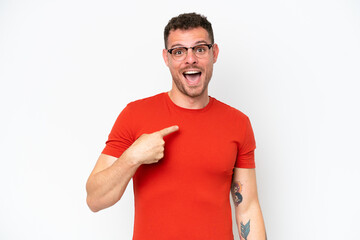 Young caucasian handsome man isolated on white background with surprise facial expression