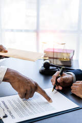 Lawyers who work with hammers and scales or read law books in the office office for consulting...