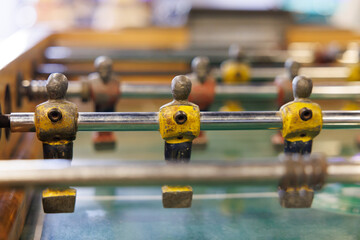 vintage foosball or wooden football table background.