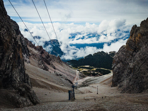 Monte Cristallo mountain in the Dolomites. Cable car in Italy among the clouds.