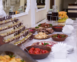 Buffet table. Various meat snacks. Wedding banquet, rich cuisine. Buffet. Appetizing snacks