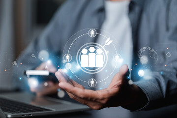Businessman showing virtual graphic human icon HR human resources recruitment team Staff management business concept.
