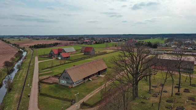 Restored old buildings of the former inhabitants of Olendry on the banks of the Vistula River, Poland.