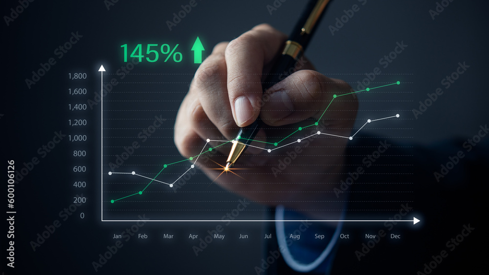 Canvas Prints hand holding pen graph virtual screen. concept marketing investment finance business.