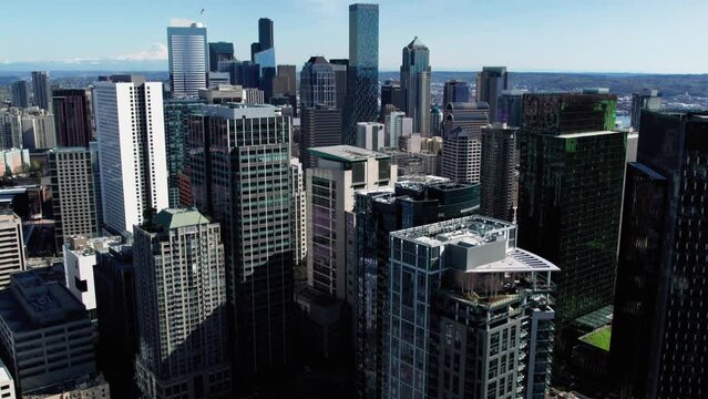Soaring Aerial Over City Skyscraper Buildings in Seattle
