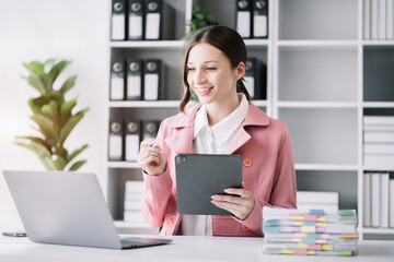 Business people working in the work area with laptop and tablet at the desk. business concepts.