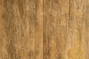 Fototapeta premium Plank background. Old wood fence closeup texture. Background made of boards. Texture of old wooden bench close up.