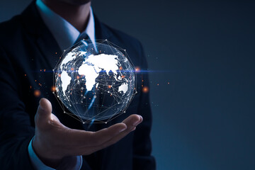 Global business.Businessman hand holding global network.Internet network connection, IoT Internet of Things, business intelligence concept.