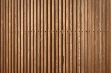 wooden strips solid wooden battens wall pattern background with natural color tone  finishing, can be used for background.