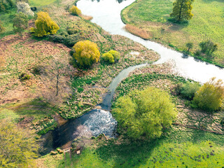 Drone view of marsh and a fresh inland water way famous for salmon.