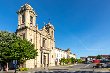 Fototapeta na wymiar Populo Church in Mannerist and rococo and neoclassical architecture style in Braga Portugal in early morning light with convento do populo beside