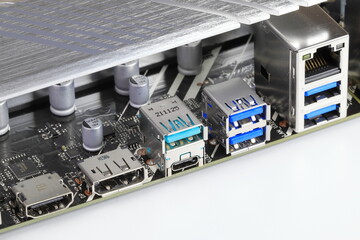 Multiple ports on modern computer mainboard show with HDMI, Display port, USB 3.2 type A and type...