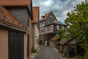 Fototapeta na wymiar small street with half timbered houses in the historical old town, Kronberg im Taunus, Germany