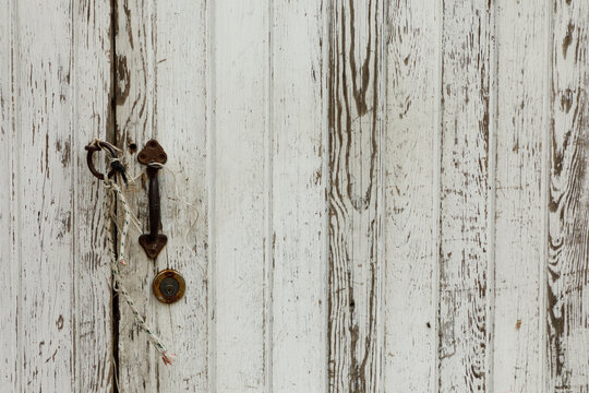 textured white door with handle