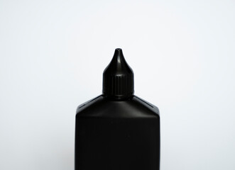 Mock up unbranded black bottle of finish line dry bicycle lubricant. Bicycle care, bicycle chain care.