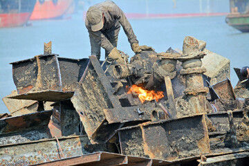 Inside of Ship breaking yard. Without safety equipment, workers are at risk.