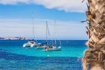 Ibiza beaches with beautiful turquoise waters. Beach at Sant Antoni de Portmany - Ibiza