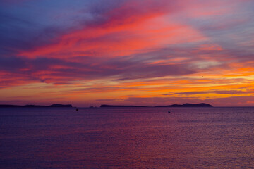 Fototapeta na wymiar Sunset at Saint Antonio de Portmany - Ibiza. Sunset at Ibiza with beautiful skies over the ocean