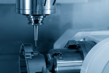 The CNC milling machine tapping process at automotive aluminum part.
