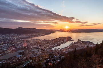 Sunset over a coastal city Fjords golden hour colorful sky