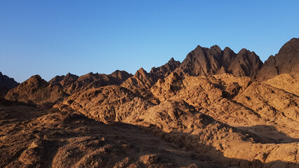 the image of the mountains on the Sinai Peninsula at sunset. the desert of Sharm el Sheikh in the evening. excursion in Egypt. travel.
