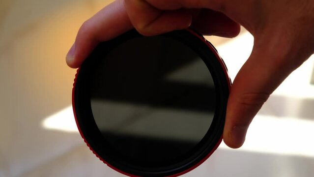 big red variable nd filter in macro shot, slow motion, 4k