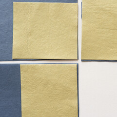 neutral paper squares or shapes on blank paper