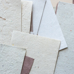 random set of layered paper cards with varied paper textures